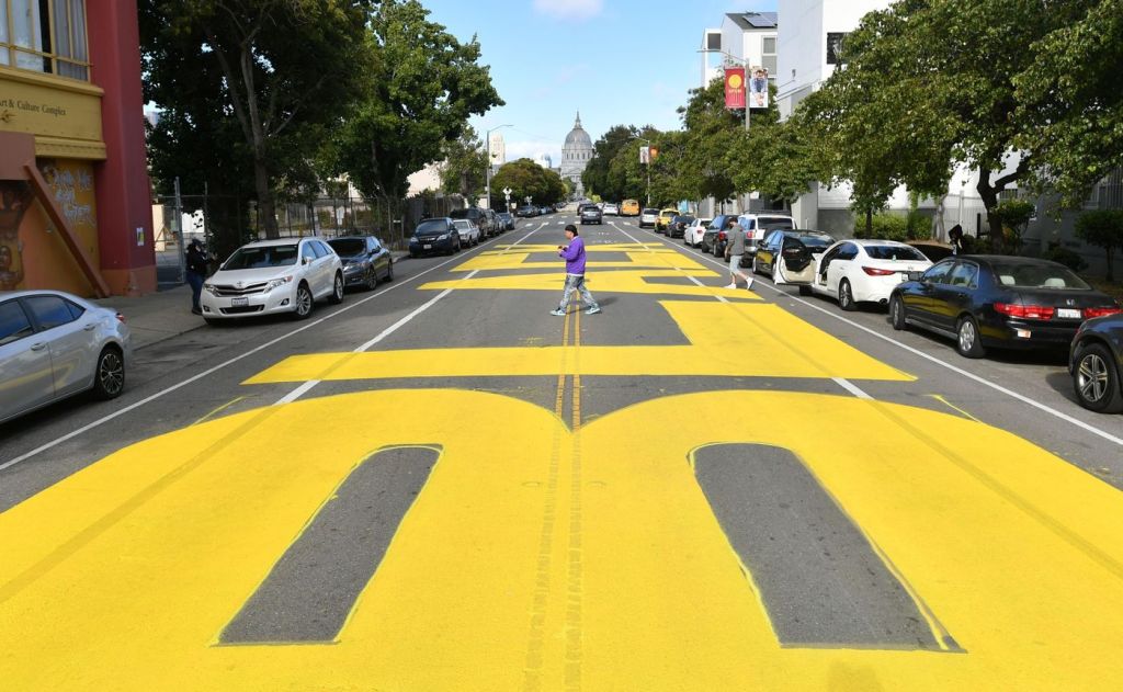 In San Francisco, a Black Lives Matter mural spans three city blocks near City Hall.Photographer: JOSH EDELSON/AFP via Getty Images